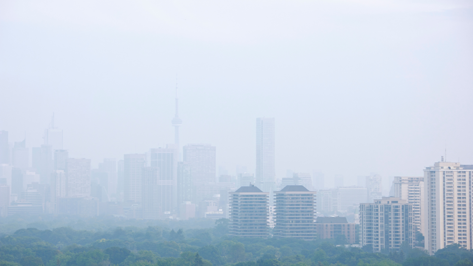 Toronto skyline including the CN tower obscured by a haze of air pollution