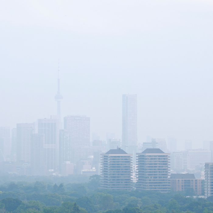 Toronto skyline including the CN tower obscured by a haze of air pollution